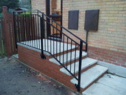 outdoor steps with metal rail