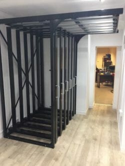 Door display rack for the showroom display of UPVC doors in their frames.